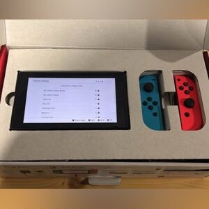 Nintendo Switch with Blue and Red Joy-Con